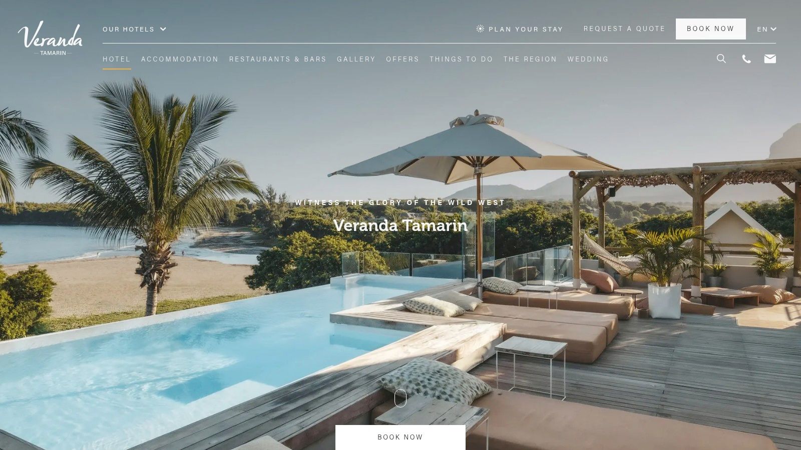 Veranda Tamarin Hotel & Spa pool area with guests relaxing