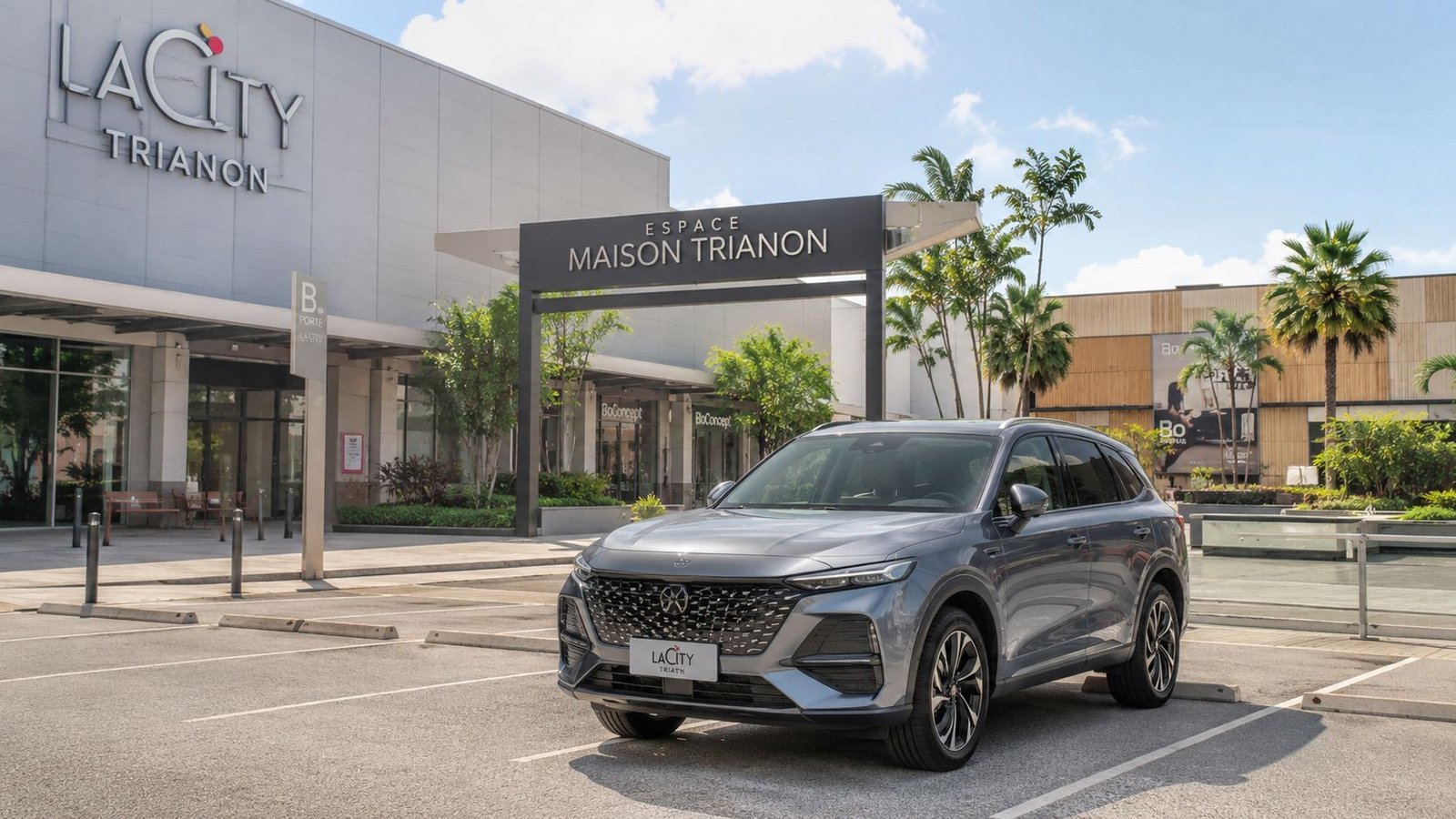 A modern grey SUV parked in front of the Espace Maison Trianon shopping center entrance under daylight.